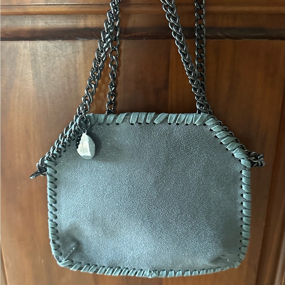 Suede crossbody purse.
